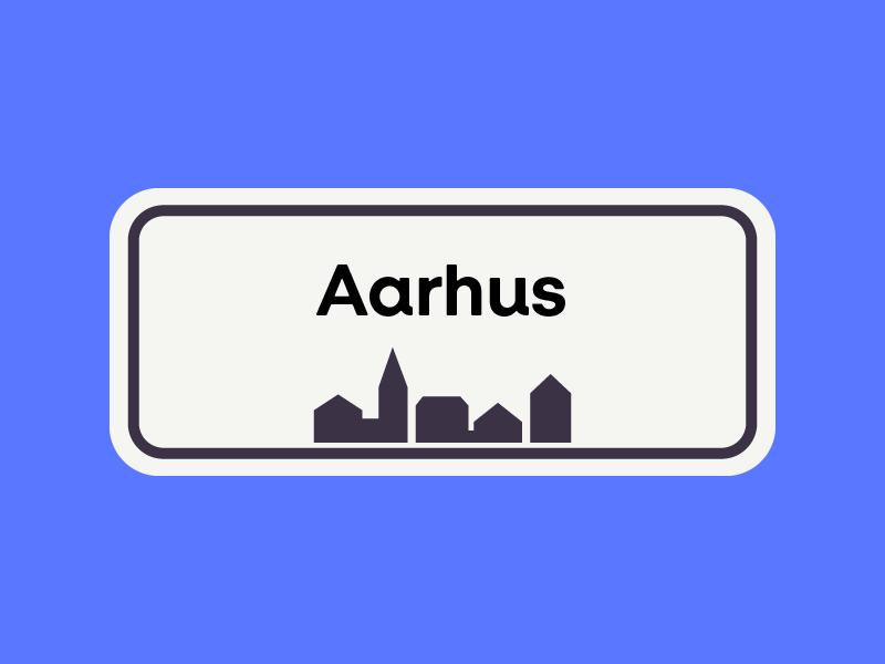 Billede der viser et Aarhus byskilt på en blå baggrund