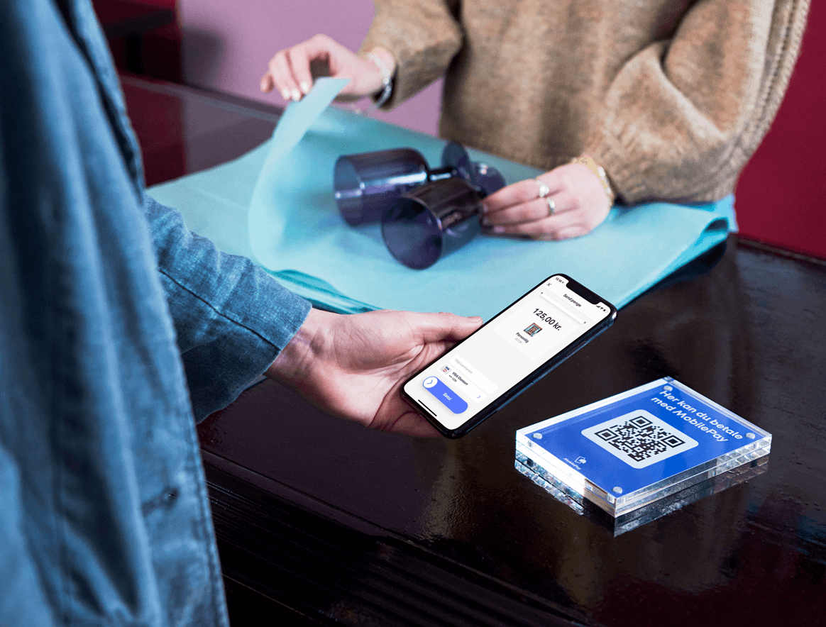 Billede som viser MobilePay-betaling via QR-kode.