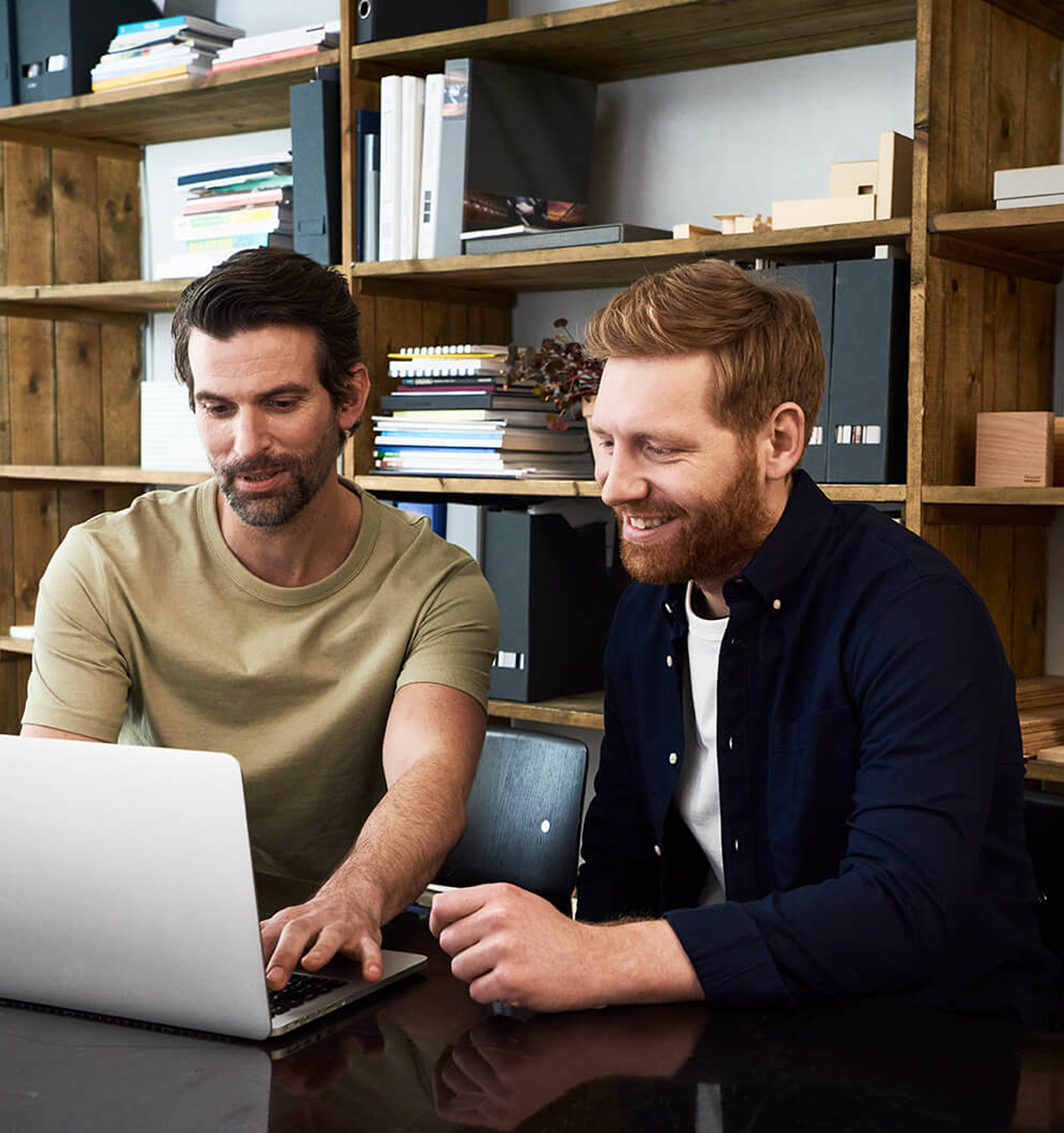 Working together on a computer.